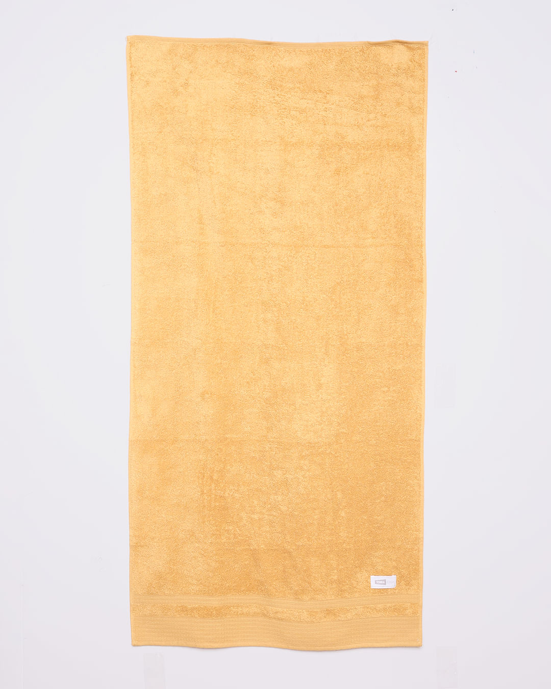 Toalha-Banho-Cosmopolita-68x135-2176-Mos---Mostarda--Claro
