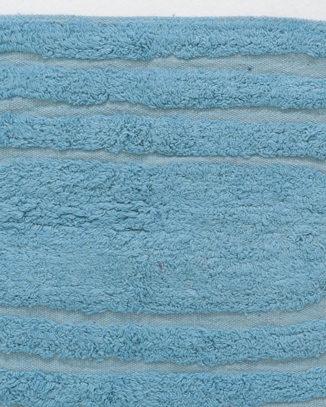 Tapete-de-Banheiro-Plumagem-Oval-40cm-x-60cm-Azul